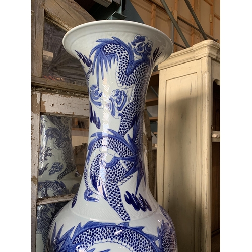 414 - Pair of enormous Chinese export blue and white porcelain floral vases, typical palette with scrolled... 