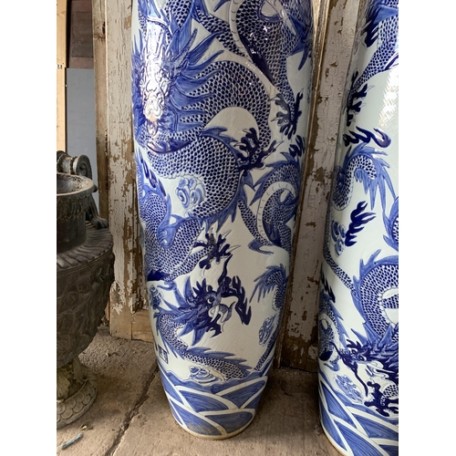 414 - Pair of enormous Chinese export blue and white porcelain floral vases, typical palette with scrolled... 