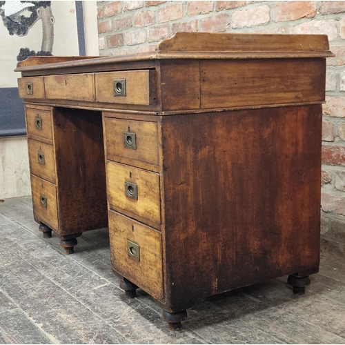 1367 - 19th century campaign pedestal desk fitted with seven drawers, removeable raised gallery back and re... 