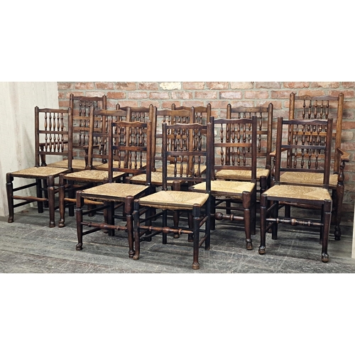 1368 - Matched set of twelve (10+2) antique Lancashire spindle back chairs with rush seats, largest H 113cm... 