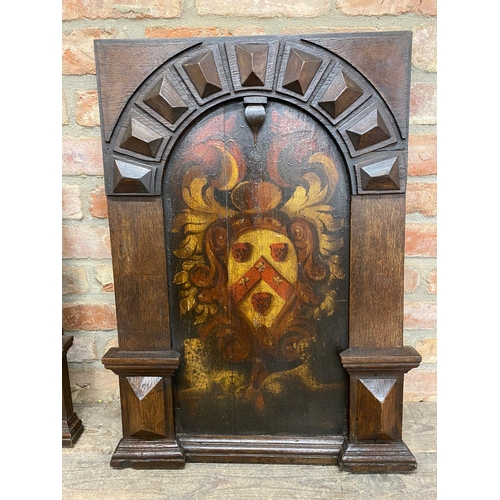 1230 - Pair of 16th/17th century arched oak panels, with original paint of a shield with cherubs and leopar... 