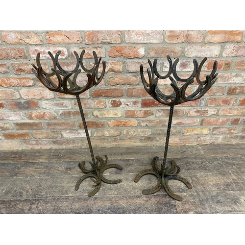 1005 - Near pair of upright scratch built iron horse shoe planters, H 80 x D 34cm