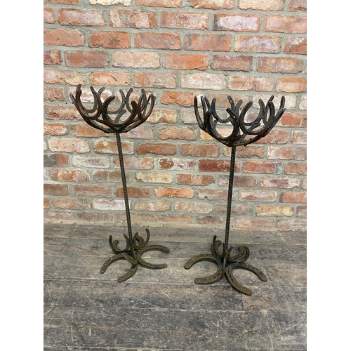 1005 - Near pair of upright scratch built iron horse shoe planters, H 80 x D 34cm