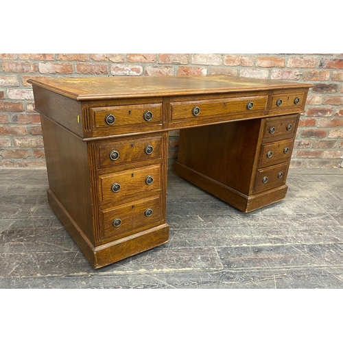 1238 - Early 20th century oak twin pedestal desk, gilt tooled leather top, W 137 x D 73 x H 75cm