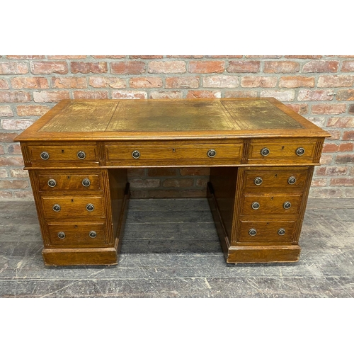 1238 - Early 20th century oak twin pedestal desk, gilt tooled leather top, W 137 x D 73 x H 75cm