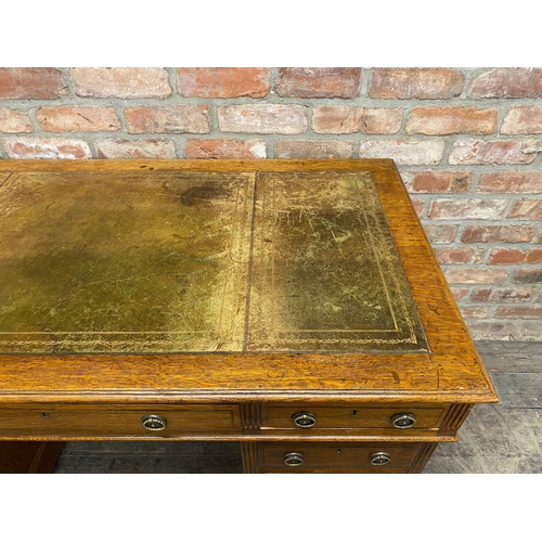 1238 - Early 20th century oak twin pedestal desk, gilt tooled leather top, W 137 x D 73 x H 75cm