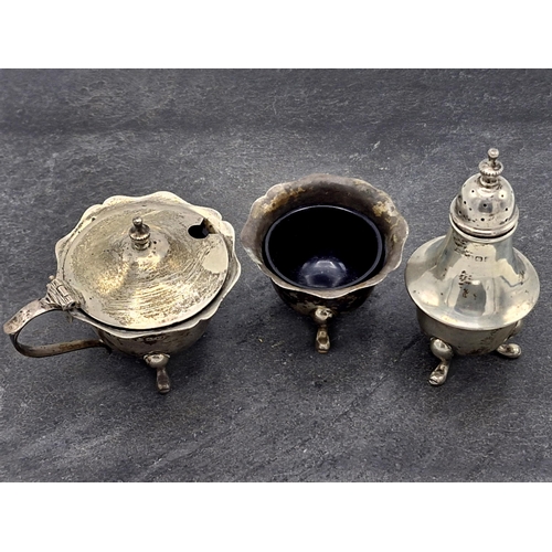 217 - Three piece silver cruet with blue glass liners, maker Joseph Gloster, Birmingham 1921, 3oz approx