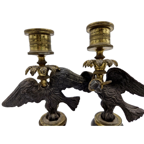 526 - Pair of antique French bronze figural candlesticks, modelled as eagles with coiled snakes, 18cm high... 