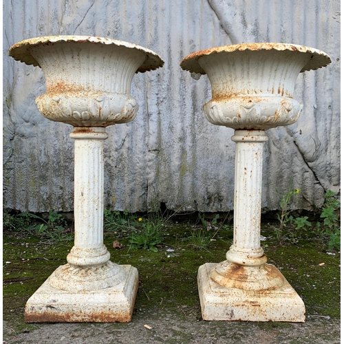 1159 - Pair of white painted cast iron pedestal urns, on fluted columns, H 82 x Dia 50cm