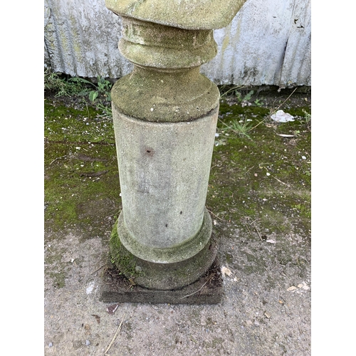 1163 - Reconstituted stone bust of Zeus, on classical column plinth, 115cm high in total