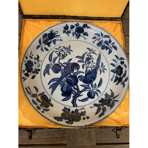 421 - Chinese export blue and white Kraak style crackle glaze porcelain charger, decorated with birds on b... 