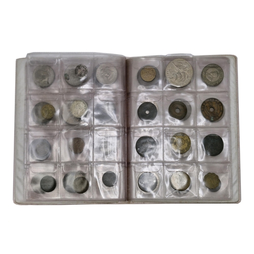 251 - Two albums of British and International coins, approx 130 coins