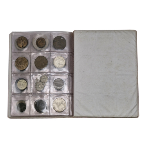 251 - Two albums of British and International coins, approx 130 coins