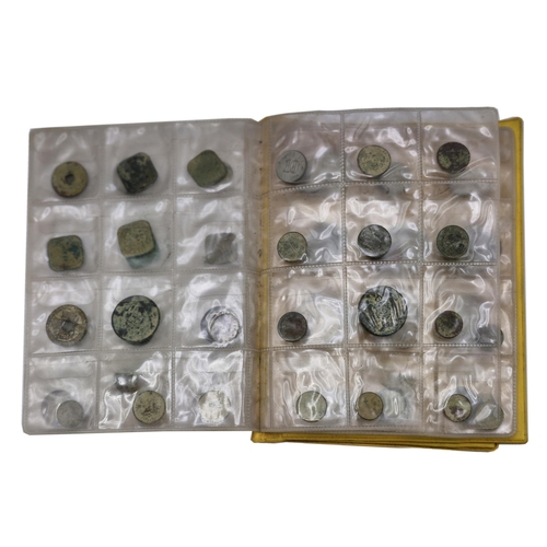 251 - Two albums of British and International coins, approx 130 coins