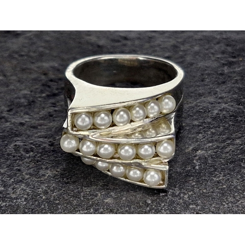 58 - Collection of silver and pearl jewellery - stylised ring and brooch, with mother of pearl - two styl... 