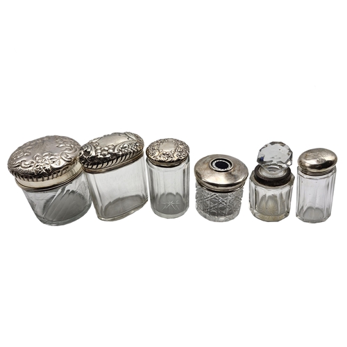 179 - Collection of five silver lidded glass scent jars, one with enamel push button, with a further ink w... 