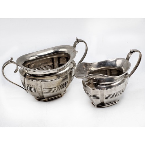 173 - Early 20th century Georgian style bachelor three piece silver tea service, maker George Nathan & Rid... 