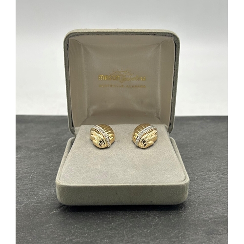 49 - Pair of 14k diamond scallop shell earrings, with band of graduated stones, 2.5 x 1.5cm, 6.8g