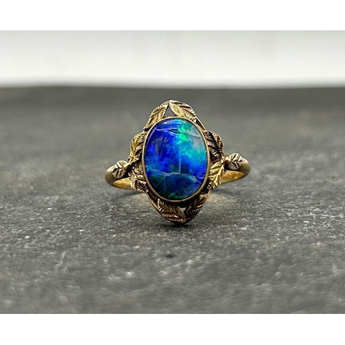 60 - 10k opal ring with stylised leaf bezel, size O, 2.8g (af)