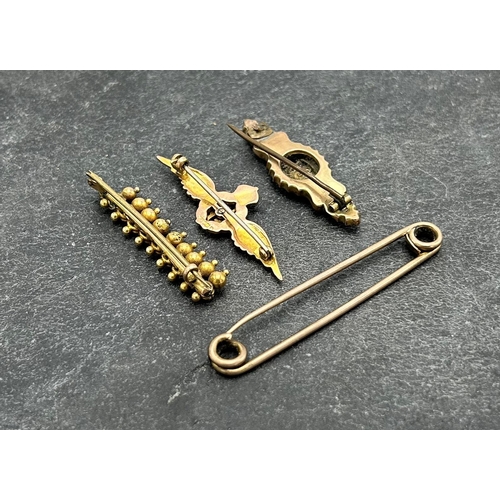 64 - Collection of gold brooches - RAF sweetheart brooch, mourning brooch, yellow metal fringe brooch and... 