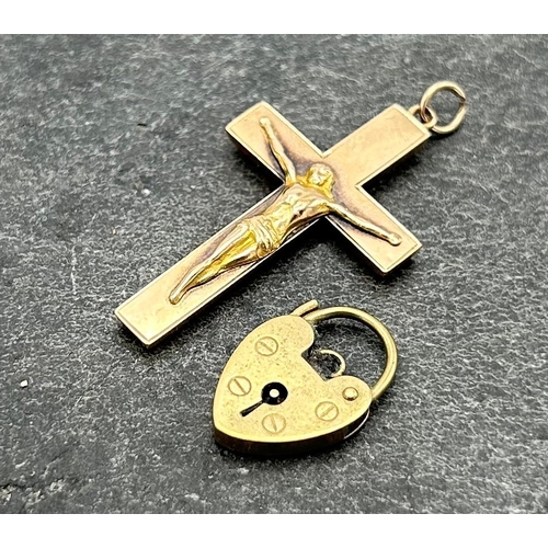 117 - 9ct crucifix pendant, 3.5 x 2.3cm and a heart padlock clasp, 3.3g (2)