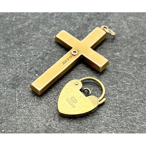 117 - 9ct crucifix pendant, 3.5 x 2.3cm and a heart padlock clasp, 3.3g (2)