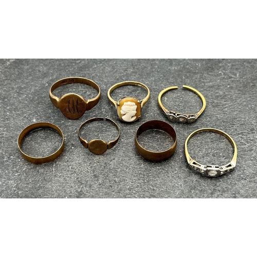 119 - 6 9ct rings, one with diamonds, with a further 15ct ring, 11.4g