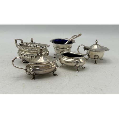 221 - Mixed silver cruet items - three mustards, two salts with blue glass liners and two spoons, to inclu... 