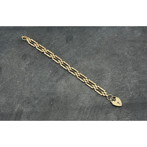 114 - 9ct gate-link panel bracelet, 18cm long, with heart padlock clasp, 8.4g