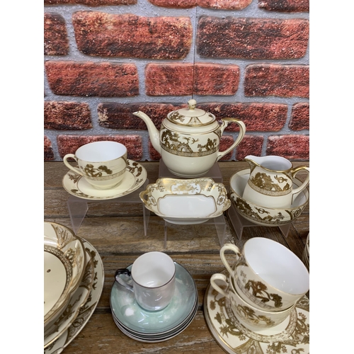 488 - Noritake gold gilt tea service with additional Noritake and Aynsley cups and saucers