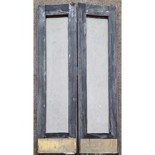 1154 - Pair of French doors of arched form with bevelled edge glass and brass kickplate, H 221cm x W 102cm ... 