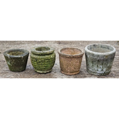 1050 - Four reconstituted stone circular garden planters of various size and design (4)