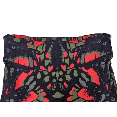 83 - Two Alexander McQueen elasticated cotton jersey skirts to include snake skin and peacock feather des... 