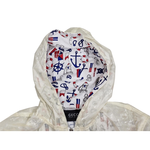 87 - Gucci plastic rain coat with nautical anchor, life ring and ships wheel pattern, size 52, BNWT