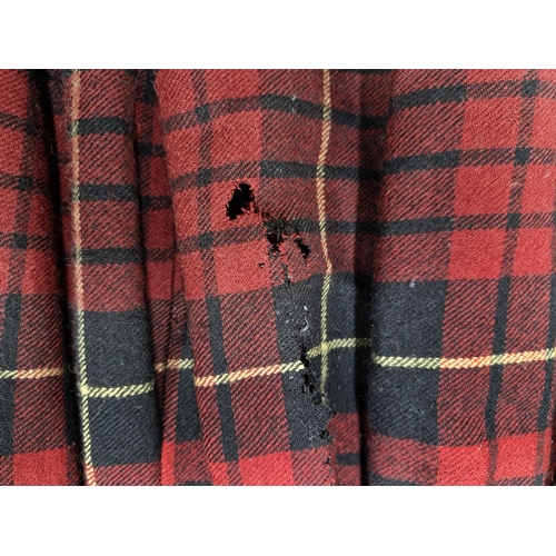 90 - Alexander McQueen black jacket and tartan skirt one piece, moth damage to skirt