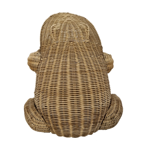 1162 - Mid-Century wicker frog design paper waste basket by Oliver Cajun having a marble eye finish, H 45cm