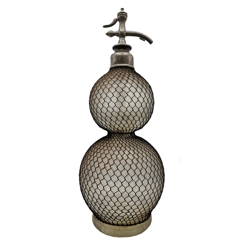 1590 - Early 20th century double gourd soda siphon with wire mesh surround, H 50cm