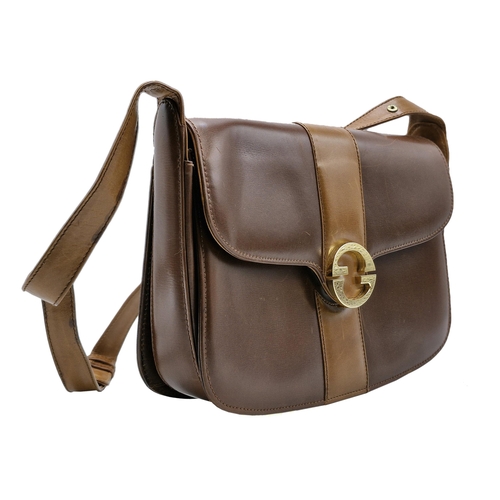 95 - Vintage Gucci brown leather snap shoulder bag with gold coloured hard ware, to include internal brow... 