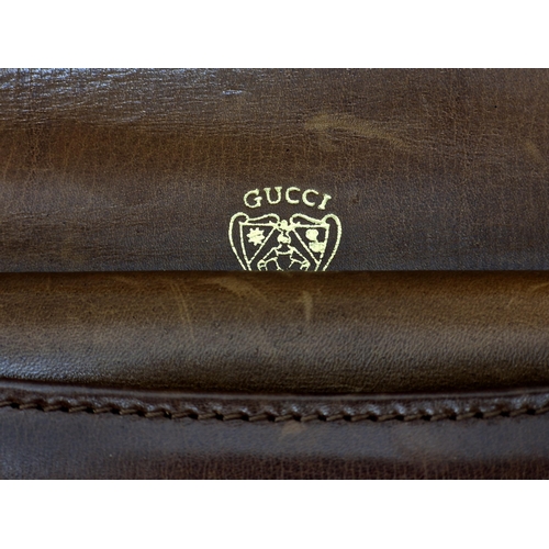 95 - Vintage Gucci brown leather snap shoulder bag with gold coloured hard ware, to include internal brow... 