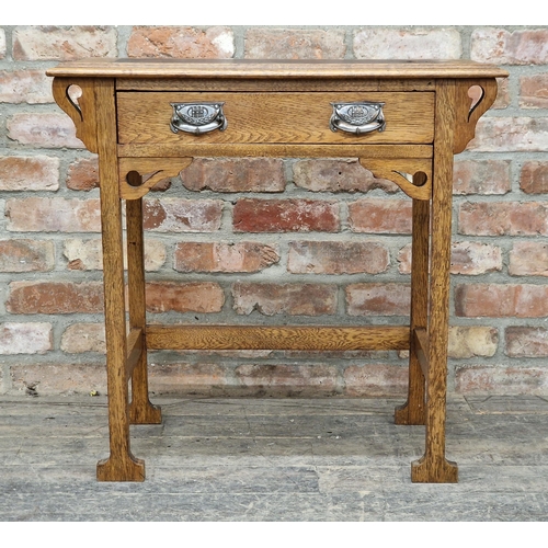 1267 - Liberty & Co - Arts and Crafts oak writing table with single drawer and inset leather top, H 73cm x ... 