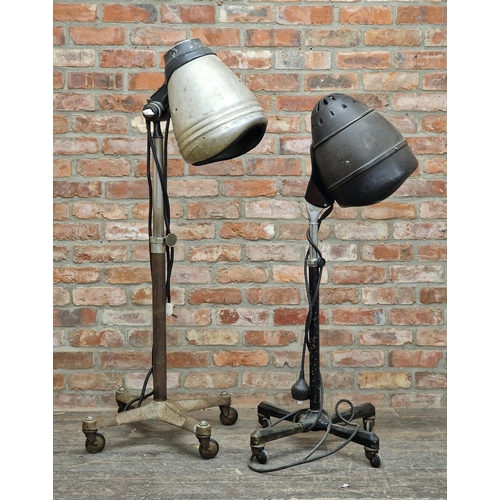 1180 - Two similar vintage Mid-century salon hairdryers raised on quadruped bases, H 149cm (largest) (2)