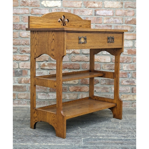 1200 - Liberty & Co - Arts and Craft oak buffet with single drawer and copper handles, purchased by the ven... 