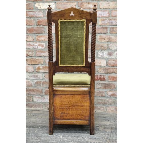 1219 - Victorian Gothic Pugin style walnut throne chair with green velvet upholstery and box base, believed... 