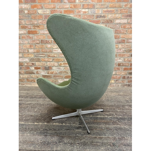 1328 - Arne Jacobsen (1902-1971) - Egg Chair, original green upholstery on cast aluminium base, H 106cm x W... 