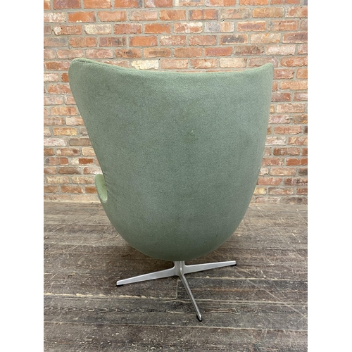 1328 - Arne Jacobsen (1902-1971) - Egg Chair, original green upholstery on cast aluminium base, H 106cm x W... 