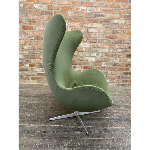 1328 - Arne Jacobsen (1902-1971) - Egg Chair, original green upholstery on cast aluminium base, H 106cm x W... 