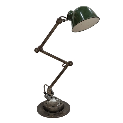 1122 - Vintage Engineers industrial style articulated machinist lamp on circular base, having green enamel ... 