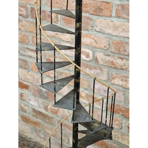 1140 - Contemporary metal standard lamp in the form of a spiralled staircase, H 167cm