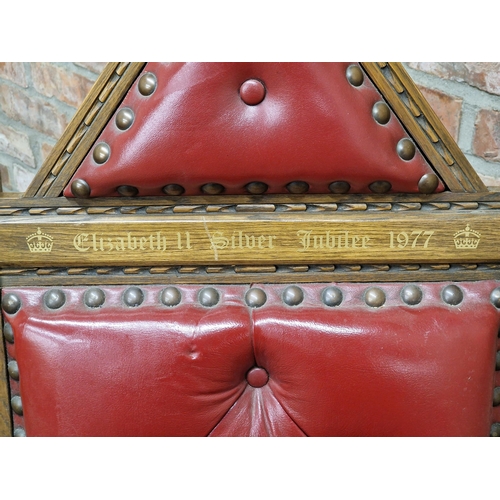 1312 - Elizabeth II Silver Jubilee 1977 solid oak throne chair with studded leather seat and back, seat num... 