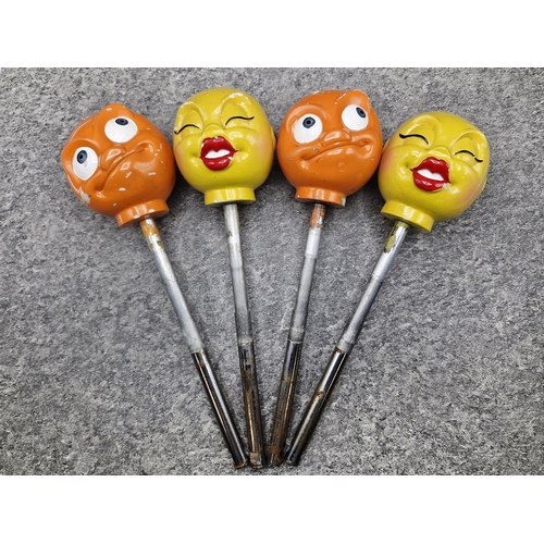 1039 - Humorous fairground levers with moulded comical heads, L 35cm (4)